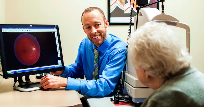 Doctor showing a scan of the eye